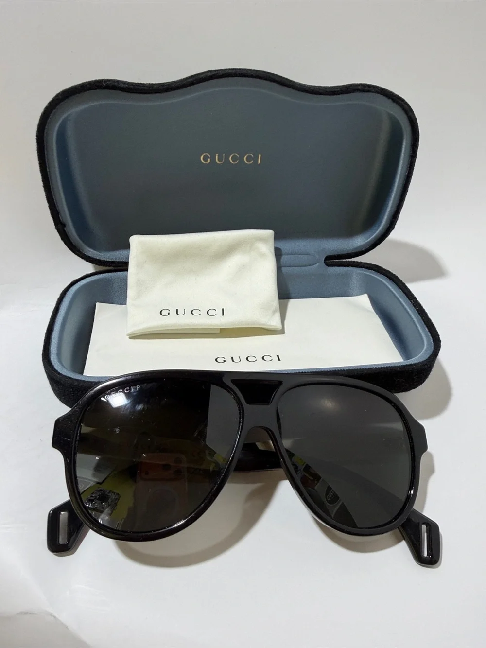 Gucci Men’s Black Sunglasses with Gold and Red Temple Accent